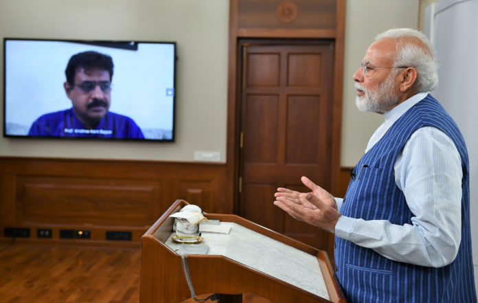 The Prime Minister, Shri Narendra Modi addresses the people of Varanasi on menace of Coronavirus through video conferencing, on March 25, 2020.
