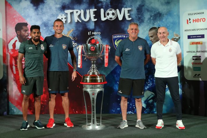 ATK FC and Chennaiyin FC Head Coaches, Antonio Lopez Habas and Owen Coyle along with captains Roy Krishna and Lucian Goian pose with the Hero ISL trophy ahead of the Final in Goa