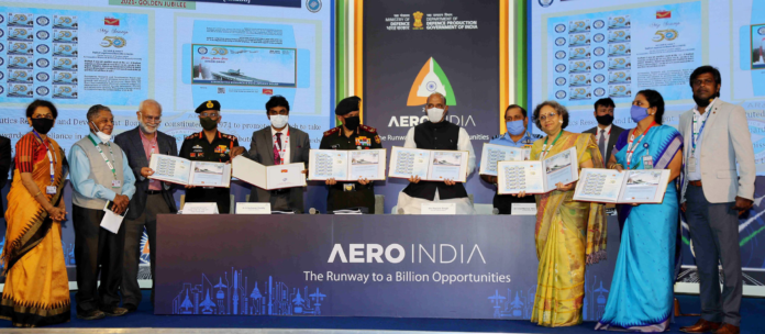 The Union Minister for Defence, Shri Rajnath Singh releasing the DRDO Documents & Procedures 2021, during the Aero India 2021, at Yelahanka, in Bengaluru on February 03, 2021. The Chief of Defence Staff (CDS), General Bipin Rawat, the Chief of the Air Staff, Air Chief Marshal R.K.S. Bhadauria, the Chief of the Army Staff, General Manoj Mukund Naravane and the Secretary, Department of Defence R&D and Chairman, DRDO, Dr. G. Satheesh Reddy are also seen.