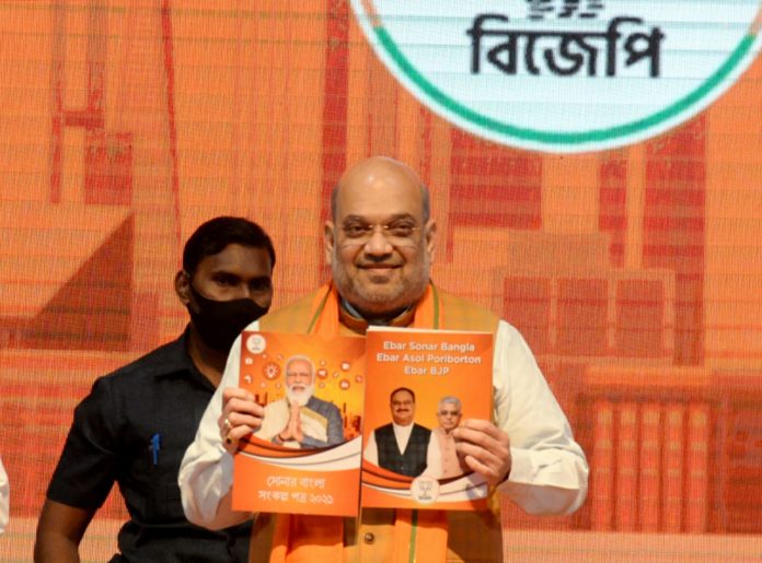 Amit Shah with West Bengal Manifesto