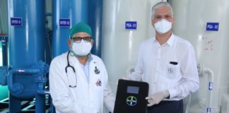 Bayer sets up Oxygen Plant at Haria L.G. Rotary Hospital in Vapi under its Covid relief initiatives Narendra Shah (on right), Director & Site Manager, Bayer Vapi Pvt. Ltd. officially transferring ownership of the Oxygen Plant set up by Bayer to Haria L.G. Rotary Hospital in Vapi, Gujarat