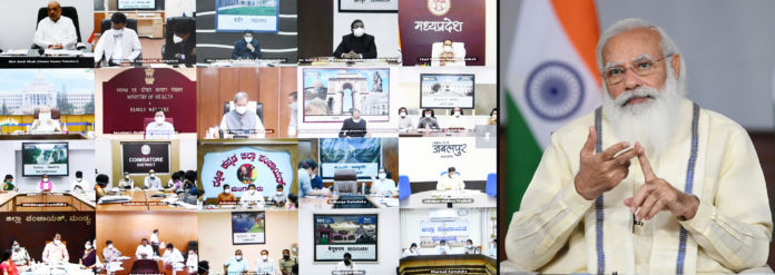 The Prime Minister, Shri Narendra Modi interacting with the State and District officials across the country on COVID-19 management, through video conferencing, in New Delhi on May 18, 2021.