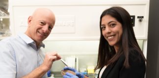 Israeli Scientists and Colleagues from US and Germany Discover How to Use Tweezers to Combat Antibiotic Resistant Bacteria Prof. Raz Jelinek (left) and his student Ravit Malishev, Photo credits- Dani Machlis BGU