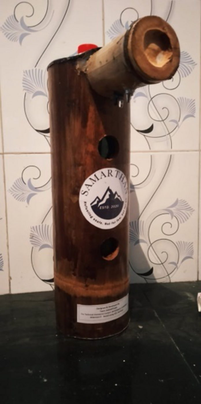 Automatic hand sanitizer dispenser out of bamboo and waste material