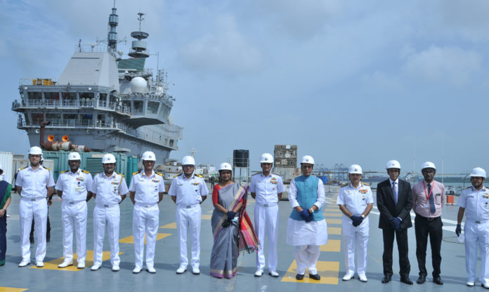 The Union Minister for Defence, Shri Rajnath Singh at Kochi Naval Base during the review of construction of first Indigenous Aircraft Carrier, in Kochi on June 25, 2021. The Chief of Naval Staff, Admiral Karambir Singh is also seen.