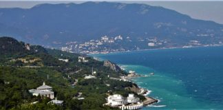President Vladimir Putin gave a series of instructions regarding the floods in Crimea The Crimean Mountains in the background and Yalta as seen from the Tsar's Path.