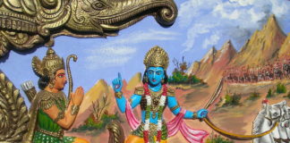 PM Modi greets people on Gita Jayanti Krishna teaching Arjuna, from Bhagavata Gita, House decoration in Bishnupur, West Bengal, India. Image by Wikipedia