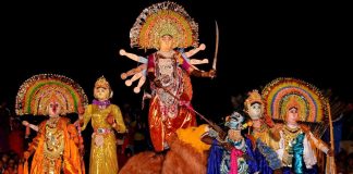 Bhowanipur 75 Palli puja committee to Celebrate World Daughter’s Day by distributing clothes to kids of 250 Chhau Dancers at Charida Village in Purulia Bhowanipur 75 Palli puja committee to Celebrate World Daughter’s Day by distributing clothes to kids of 250 Chhau Dancers at Charida Village in Purulia