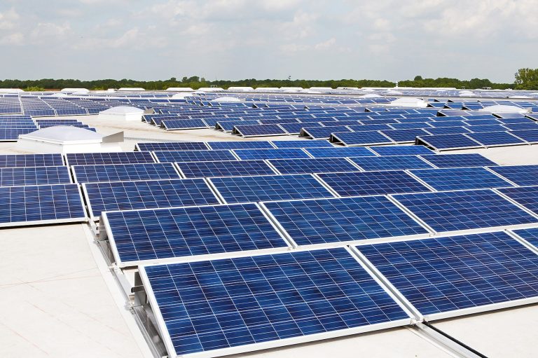 Solar array mounted on a rooftop by Wikipedia