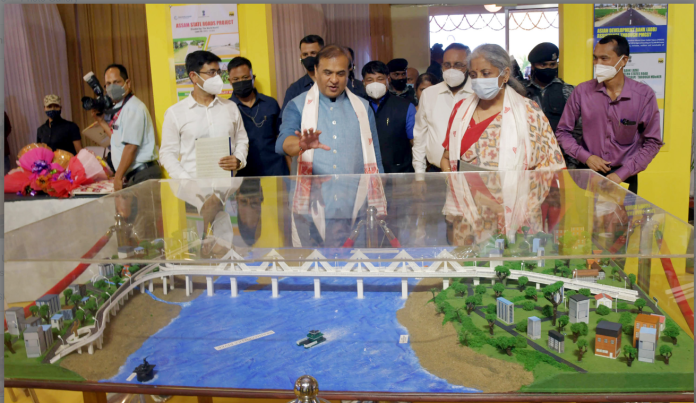 The Union Minister for Finance and Corporate Affairs, Smt. Nirmala Sitharaman visiting the Exhibition on Externally Aided Projects for the State, in Guwahati, Assam on October 07, 2021. The Chief Minister of Assam, Shri Himanta Biswa Sarma is also seen.