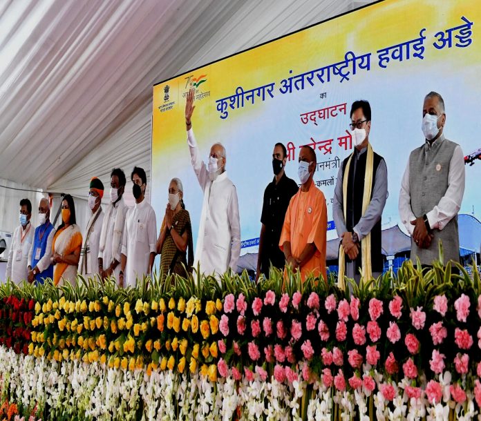 The Prime Minister, Shri Narendra Modi at the inauguration of the Kushinagar International Airport, Uttar Pradesh on October 20, 2021. The Governor of Uttar Pradesh, Smt. Anandiben Patel and other dignitaries are also seen.