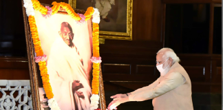 The Prime Minister, Shri Narendra Modi paying tributes to Mahatma Gandhi on his 152nd birth anniversary, at Parliament House, in New Delhi on October 02, 2021