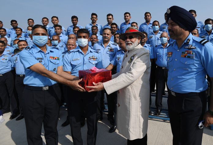 The Prime Minister, Shri Narendra Modi celebrating Diwali with the Indian Airforce Soldiers, at Jammu Airport on November 04, 2021.