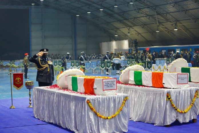 The Air Officer Commanding-in-Chief, Western Air Command, Air Marshal Amit Dev paying his last respect to General Bipin Rawat, Mrs. Madhulika Rawat and other personnel of the Armed Forces, at Palam Airport, in New Delhi on December 09, 2021.