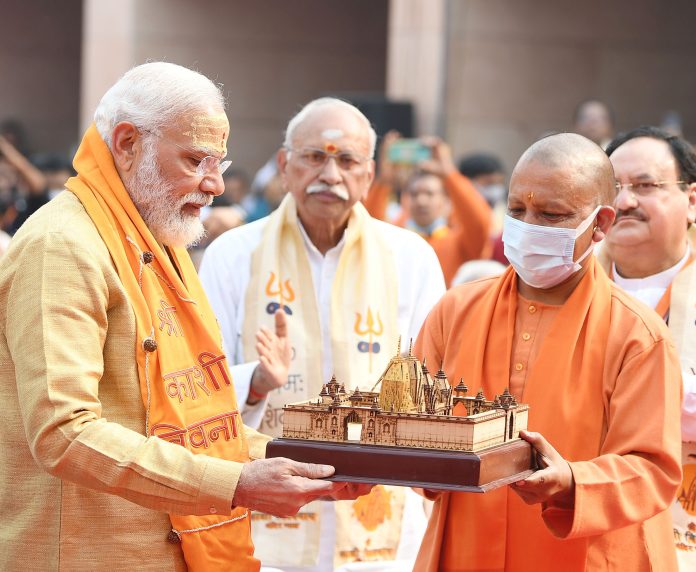 The Prime Minister, Shri Narendra Modi at the inauguration of Kashi Vishwanath Dham, in Varanasi, Uttar Pradesh on December 13, 2021. The Chief Minister of Uttar Pradesh, Yogi Adityanath is also seen.