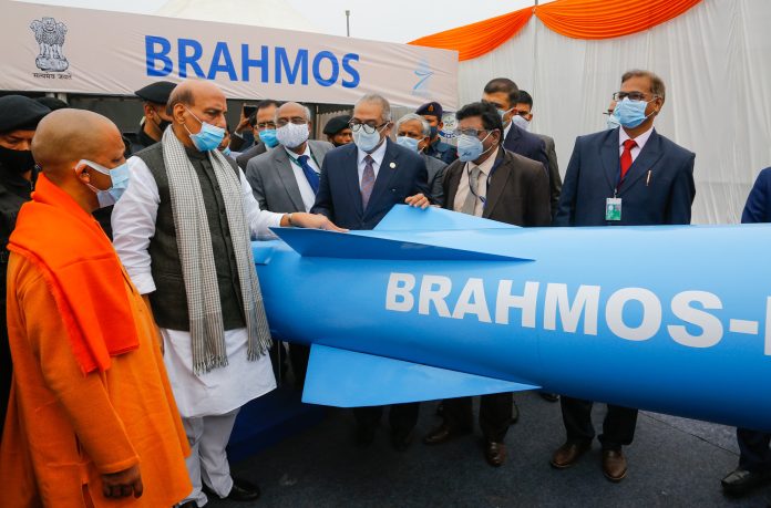 The Union Minister for Defence, Shri Rajnath Singh visiting the exhibition of Defence Research and Development Organisation (DRDO), during the foundation stone laying ceremony of Defence Technologies & Test Centre and BrahMos Manufacturing Centre, in Lucknow, Uttar Pradesh on December 26, 2021. The Chief Minister of Uttar Pradesh, Yogi Adityanath and the Secretary, Department of Defence R&D and Chairman, DRDO, Dr. G. Satheesh Reddy are also seen.