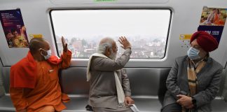 PM Modi inaugurates Kanpur Metro Rail Project The Prime Minister, Shri Narendra Modi traveling in Kanpur Metro, Uttar Pradesh on December 28, 2021. The Union Minister for Petroleum & Natural Gas, Housing and Urban Affairs, Shri Hardeep Singh Puri and the Chief Minister of Uttar Pradesh, Yogi Adityanath are also seen.