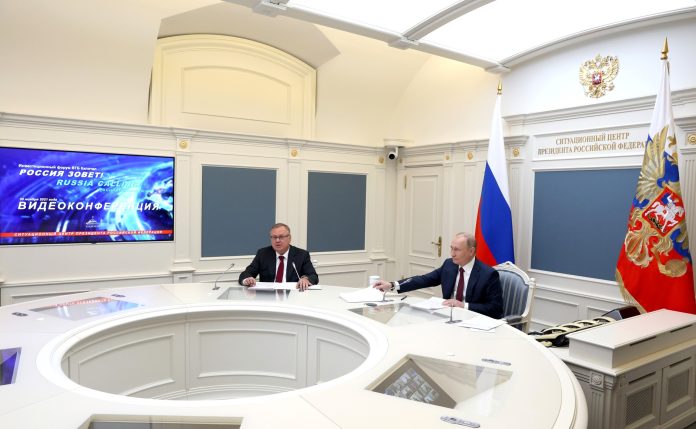President Putin With VTB Bank President and Chairman of the Board Andrei Kostin during a plenary session of the Russia Calling! Investment Forum