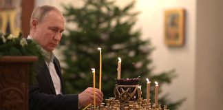 Putin At Christmas mass at the Church of the Mandylion.