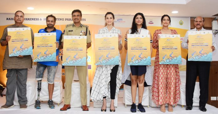 Chief Guest Shri C.V. Anand, Commissioner of Police, Hyderabad; flanked by (L-R) Shri SK Joshi, Trustee, AMF & Past Chief Secretary, Telangana; Shri Aditya Mehta, Founder, Aditya Mehta foundation; Ms Shilpa Reddy, Trustee, AMF & Ex Mrs. India & Entrepreneur; Ms Lakshmi Manchu, Mentor to AMF & Actress, Philanthropist; Ms Regina Cassandra, Trustee, AMF & Actress & Shri K Durga Prasad, Mentor to AMF & Past DG, CRPF; releasing the poster of the Infinity Ride 2022, hosted by Aditya Mehta Foundation (AMF), to be held from 6th to 18th September 2022 from Shimla to Kaza-Manali; at Jubilee Hills International Centre, today.