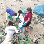 Cleaning garbage from the beach
