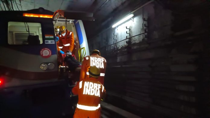 A PASSENGER EVACUATION MOCK DRILL CONDUCTED WITH NDRF IN KOLKATA METRO TUNNELS