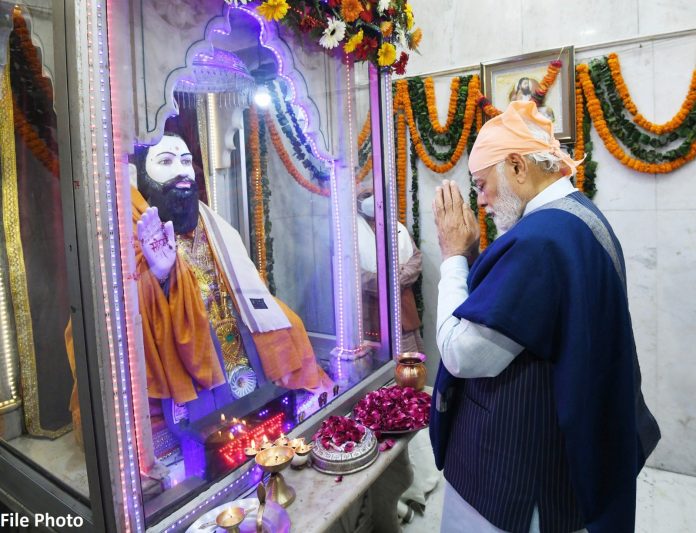 PM MODI pays tribute to Sant Ravidas Ji Photo by Official Tweet of @narendramodi