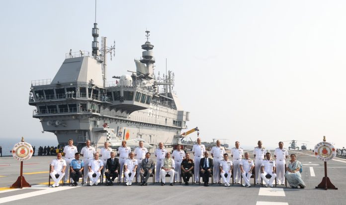 The Union Minister for Defence, Shri Rajnath Singh attends the Naval Commanders' Conference aboard INS Vikrant on March 06, 2023. The Minister of State for Defence and Tourism, Shri Ajay Bhatt, the Chief of Defence Staff, General Anil Chauhan, the Chief of the Naval Staff Admiral R Hari Kumar and the Defence Secretary, Shri Giridhar Aramane are also seen.