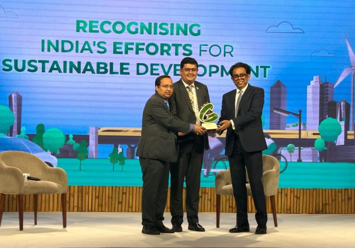 CA. Aniket Sunil Talati-President, ICAI along with CA. (Dr.) Sanjeev Kumar Singhal, Central Council Member receives Green Ribbon Champions Award for Commitment to Sustainable Accounting from Shri Rohit Kumar Singh, Secretary, Food and Public Distribution Govt. of India.
