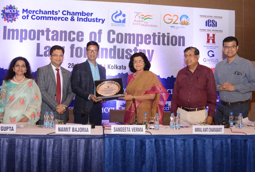 Shri Namit Bajoria, President, MCCI presenting a memento to Dr. Sangeeta Verma, Chairperson Competition Commission of India (CCI). (L - R) : Smt. Mamta Binani, Chairperson, Council on Legal & Corporate Governance, MCCI, Shri Manish Gupta, President, The Institute of Company Secretaries of India (ICSI) Prof. Dr. Nirmal Kanti Chakrabarti, Vice Chancellor, The West Bengal National University of Juridical Sciences (NUJS) and Prof. V. K. Unni, Professor, Public Policy & Management IIM Calcutta at the Special Session on 'Importance of Competition Law for Industry' held today at The Lalit Great Eastern, Kolkata.