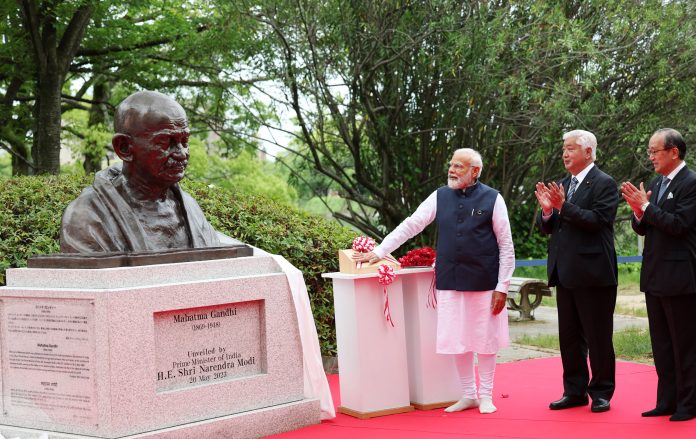 PM unveiling the bust of Mahatma Gandhi, in Hiroshima, Japan on May 20, 2023.