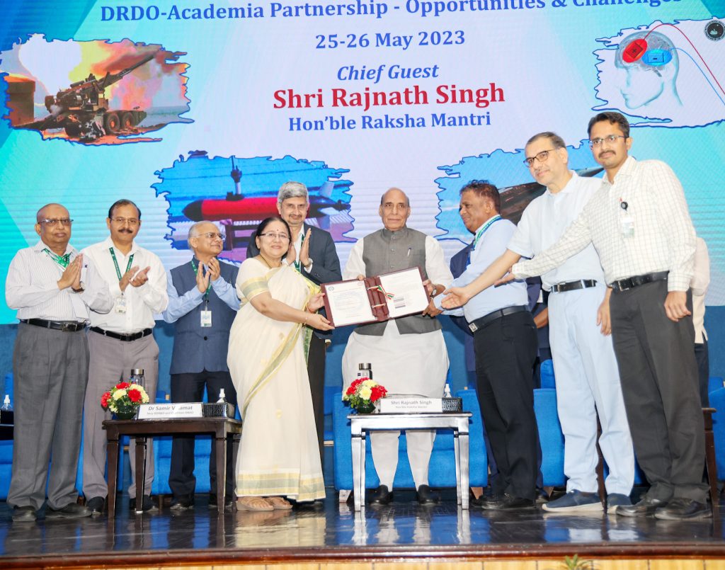 The Union Minister for Defence, Shri Rajnath Singh felicitating eminent scientists during the DRDO- Academia conclave, in New Delhi on May 25, 2023.