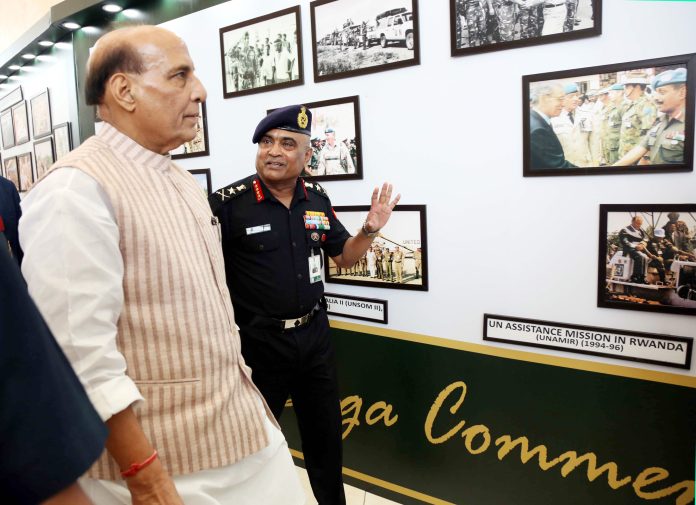 The Union Minister for Defence, Shri Rajnath Singh at the photo exhibition organised on the sidelines of the special commemorative seminar that celebrated 75 years of UN Peacekeeping, in New Delhi on June 13, 2023.