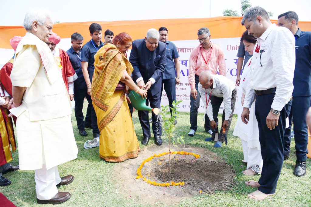The Vice President, Shri Jagdeep Dhankhar and Dr. Sudesh Dhankhar planting a sapling at the premises of University of Jammu, in Jammu & Kashmir on June 22, 2023.