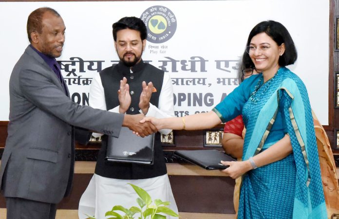 The Union Minister for Information & Broadcasting, Youth Affairs and Sports, Shri Anurag Singh Thakur witnesses the Signing of MoU between Indias NADA (National Anti Doping Agency) and South Asia Regional Anti Doping Organisation (SARADO), in New Delhi on July 03, 2023.