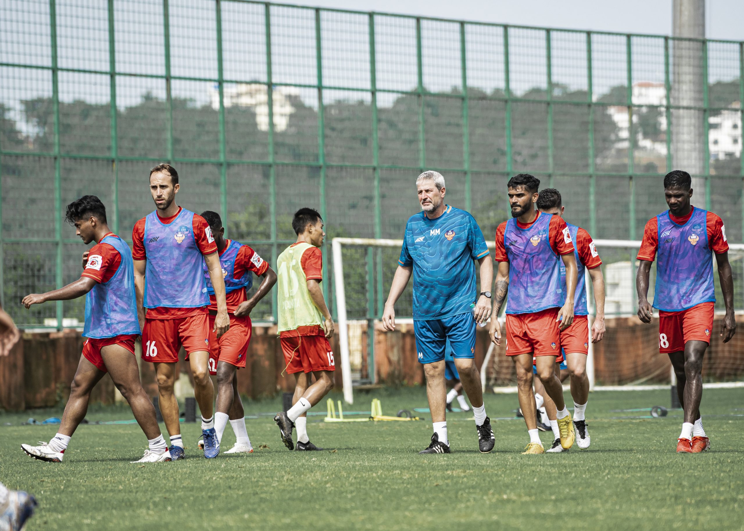 FC Goa players in training under the eagle eyes of coach Manolo Marquez (in blue in the middle) ahead of their first 132nd IndianOil Durand Cup game in Guwahati