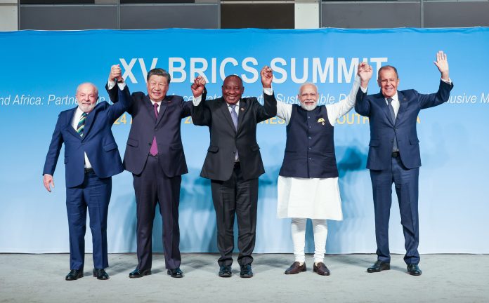 PM in a family photograph during the BRICS Leaders Retreat Meeting, at Johannesburg, in South Africa on August 23, 2023.