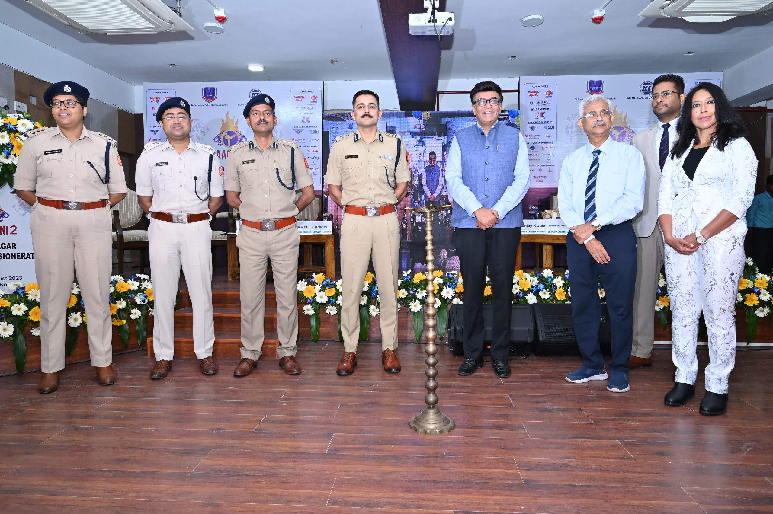 Indian Chamber of Commerce in collaboration with Bidhannagar Police Commissionerate flags the most appreciated women empowerment initiative 'Baaghini 2.' Mr. Gaurav Sharma, IPS, Hon'ble Commissioner of Police, Ms. Charu Sharma, IPS, Additional Deputy Commissioner of Police Detective Department, Bidhannagar Police Commissionerate, Ms. Debarati Mukhopadhyay, Author, Mr. Sanjay K Jain, Chairman, ICC National Committee on Textiles and MD, TT Limited and Prof. Dhrubajyoti Chattopadhyay, Vice Chancellor, Sister Nivedita University were present in the event.