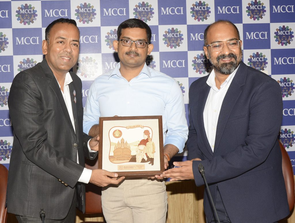 Shri Yashovardhan Gupta, Chairman, Council on IT & Communication, MCCI presenting a memento to Shri Sayak Das, IPS, Special Superintendent of Police, Cyber Crime and Economic Offence Wing [EOW], Criminal Investigation Department [CID], West Bengal and on his right - Shri Sanjib Sanghi, Co Chairman, Council on IT & Communication, MCCI at the Workshop on "Implementing Cyber Security : Best Practices and Hygiene" held today at MCCI Conference Hall.