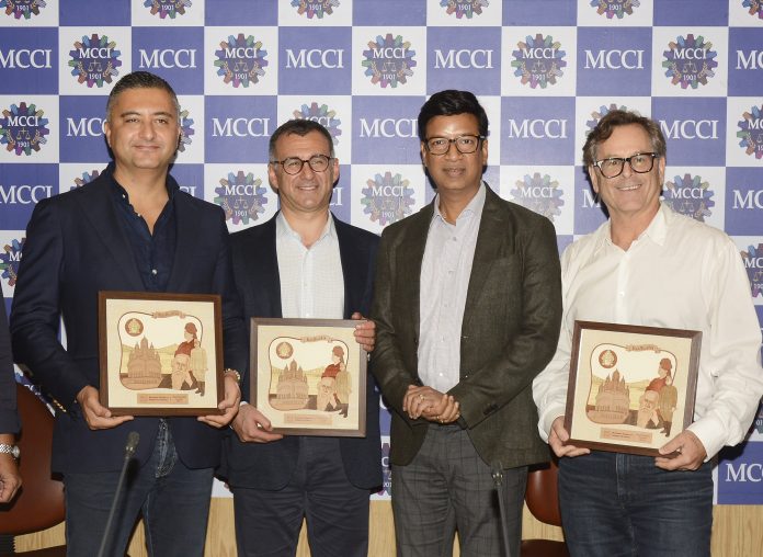Mr. Namit Bajoria, President, MCCI presenting mementos to (L - R) :Mr. Mehmet Komurcu, Partner, Dentons Canada LLP,, Mr. Eren Sari, Manager, Business Immigration & Development, Green & Spiegel (G&S) and Mr. Stephen W. Green, Senior Managing Partner, Green & Spiegel (G&S), and at a Special Session on Canada : The Gateway to Global Business held today at the Conference Hall of the Chamber.