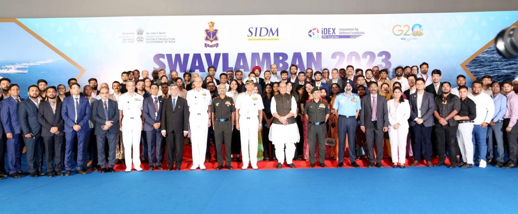 The Union Minister for Defence, Shri Rajnath in a group photographs during the plenary session of ‘Swavlamban 2.0’, the two-day seminar of Naval Innovation and Indigenisation Organisation (NIIO), in New Delhi on October 04, 2023.