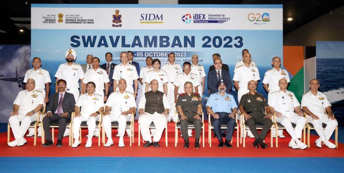 The Union Minister for Defence, Shri Rajnath in a group photographs during the plenary session of Swavlamban 2.0, the two-day seminar of Naval Innovation and Indigenisation Organisation (NIIO), in New Delhi on October 04, 2023.