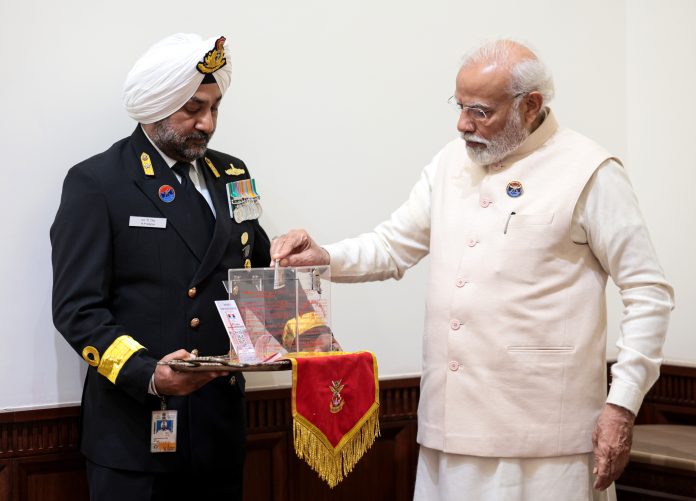 PM making a contribution to Armed Forces Flag Day Fund on the occasion of Armed Forces Flag Day, in New Delhi on December 07, 2023.