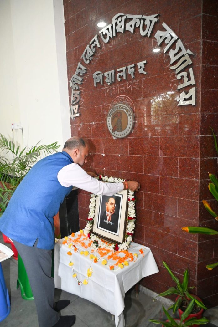Shri Deepak Nigam, Divisional Railway Manager, Sealdah division paid floral tributes to the portrait of Dr. Ambedkar.