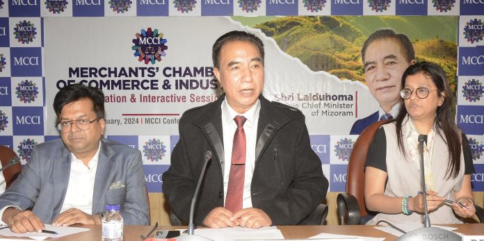Shri Lalduhoma, Hon'ble Chief Minister of Mizoram addressing at the Felicitation & Interactive Session held today (05.01.2024) at Conference Hall of the Chamber. On his right - Shri Amit Kumar Saraogi, Chairman, Council on Animal Husbandry & Fisheries, MCCI and on his left - Smt. Priti A. Sureka, Vice President, MCCI.