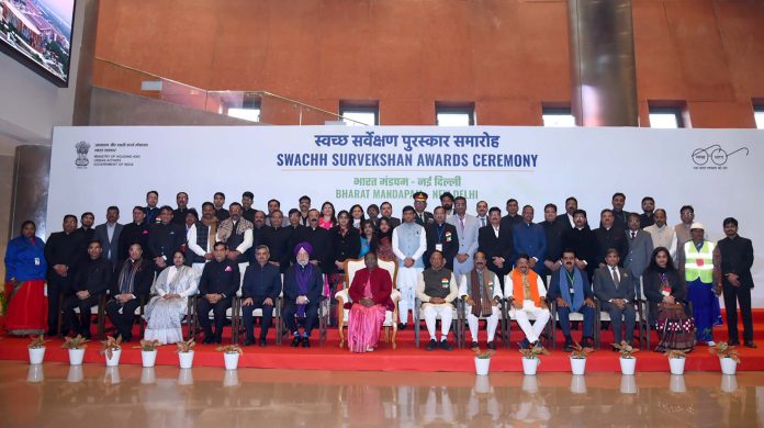 The President of India, Smt Droupadi Murmu in a group photograph during the Swachh Survekshan Awards Ceremony at Bharat Mandapam, in New Delhi on January 11, 2024.