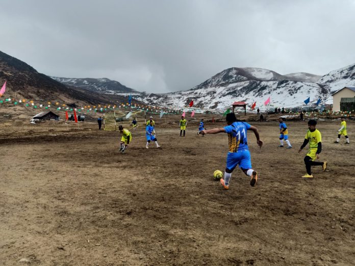 TRISHAKTI CORPS ORGANISES FOOTBALL MATCH AT AN ALTITUDE OF 12600 FEET IN THE BORDER VILLAGE OF EAST SIKKIM ON THE INDO-CHINA BORDER UNDER OPERATION SADBHAVANA.