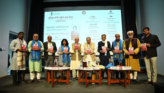 Guests and Dignitaries releasing the book