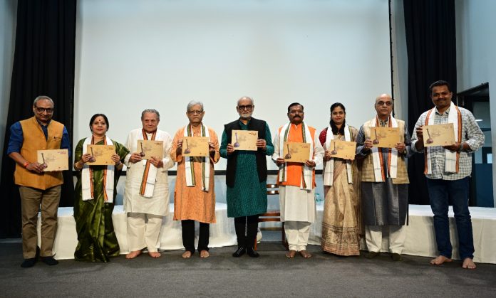 Dignitaries releasing the Book