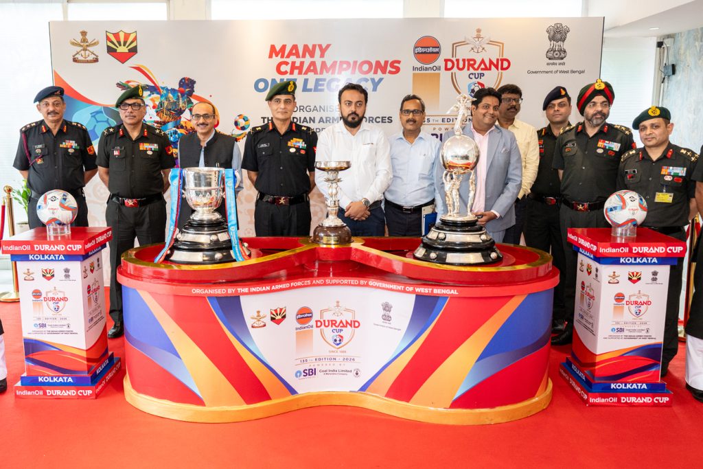 Major General Dinesh Kumar Singh, SM, VSM, General Officer Commanding, Bengal Sub Area and Vice Chairman, Durand Cup Organising Committee; Shri Rajesh Pandey, IAS, Additional Chief Secretary, Department of Youth Services & Sports and Department of Cooperation, Government of West Bengal; Lieutenant General Gambhir Singh, UYSM, AVSM, YSM, Chief of Staff, Headquarters Eastern Command and Chairman, Durand Cup Organising Committee; Dr. Indranil Khan, Hon'ble Minister of State (Independent Charge), Department of Youth Services and Sports and Department of Consumer Affairs, Government of West Bengal, along with other dignitaries, pose with the Durand Cup, President's Cup and Simla Trophy during the Trophy Showcase and Press Conference of the 135th IndianOil Durand Cup at AOI Vijay Durg, Kolkata, on Wednesday.